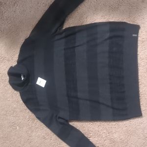 Brand new Calvin Klein light turtleneck sweater.
